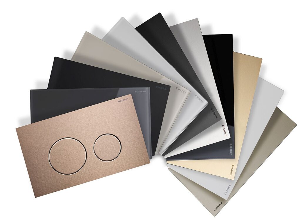 Die Betätigungsplatte Sigma40 gibt es als Variante mit eckigen oder mit runden Tasten. Sie ist ab 2026 in insgesamt 11 Farben und drei Oberflächen erhältlich. Bild: Geberit